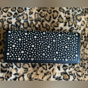 YSL black jeweled embellished leather clutch